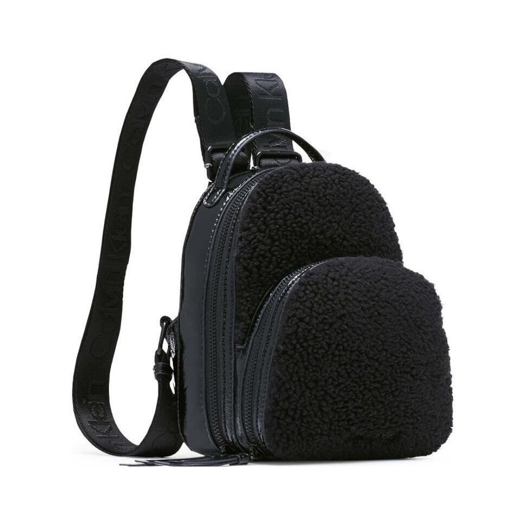 CALVIN KLEIN Astatine sherpa and patent leather mini backpack - Black